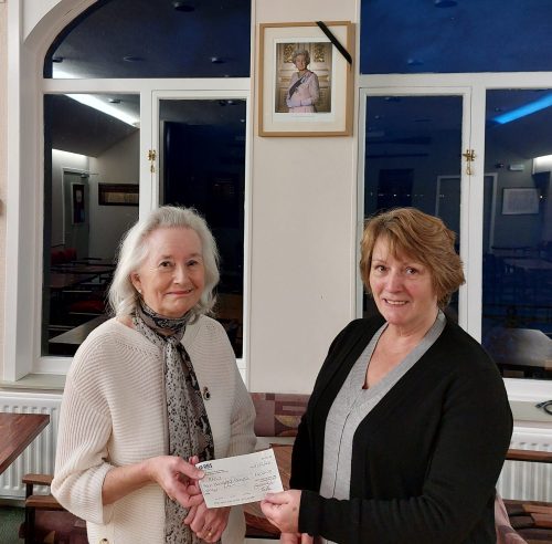 Rose Sloan (RWSABC Vice-President) passing a £400 cheque for RNL to Anne Dunnet (RNLI Local rerpresentative)